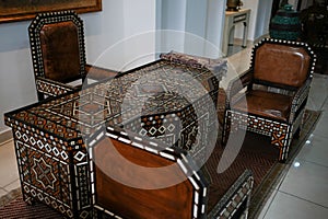 Detailed art relic chairs and table