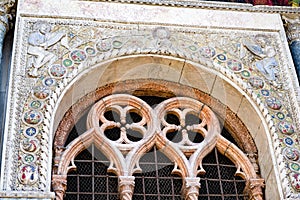 Detailed carvings on the exterior of St. Mark`s Basilica in Venice.