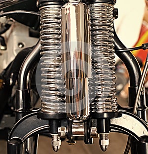 detailed chrome hydraulic shock absorber or rear suspension shock motorcycle custombike part