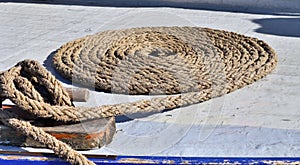 Detailed close up detail of ropes and cordage in the rigging of an old wooden vintage sailboat