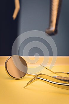 Detailed close up of different dental instruments and tools on a