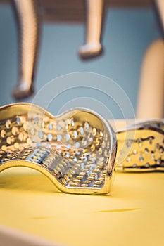 Detailed close up of different dental instruments and tools on a