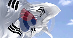 Detailed close up of the national flag of South Korea waving in the wind on a clear day