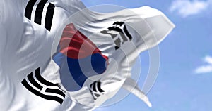 Detailed close up of the national flag of South Korea waving in the wind on a clear day