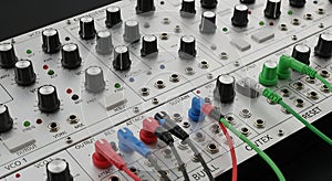 Modular Synthesizer Control Panel with Colorful Patch Cables