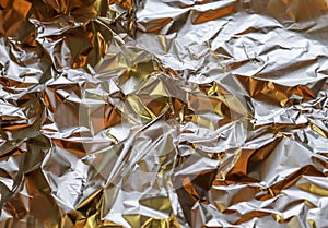 Detailed close up view on colorful lightened aluminum foil textures