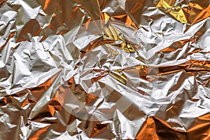 Detailed close up view on colorful lightened aluminum foil textures