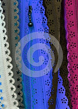 Detailed close up view on colorful textile fabrics textures found on a german fabrics market