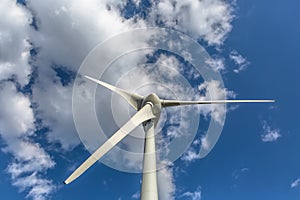 Detailed close up view of a wind turbine; generator, rotor and blade