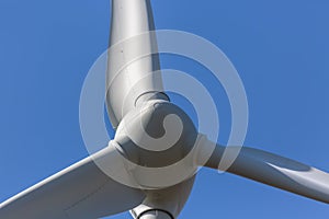 Detailed close up view of a wind turbines; generator, rotor and blade view