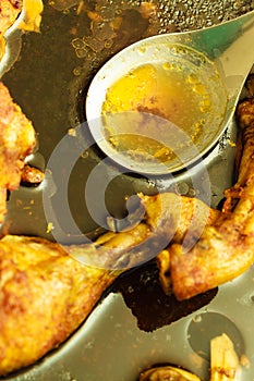 Detailed closeup of cooked chicken meat in stewpan