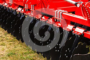 Detailed closeup of disc harrow agricultural machinery