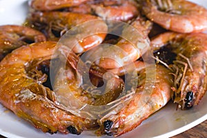 Detailed Closeup of Garlic Shrimps bathed in Chili Sauce. A variation of Gambas al Ajillo