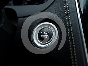 Close Up View Of Car Engine Start Stop Button On Dashboard