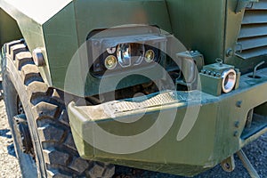 Detailed front view of a modern military truck with LED headlights