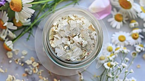 A detailed image of a jar filled with moonstone chips and chamomile buds the perfect combination for promoting peaceful