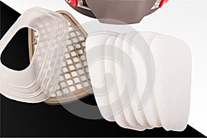 Safety gear showcased with mask and filter components for effective protection in various environments photo