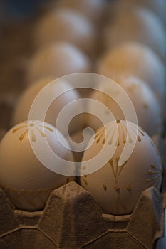 Detailed macro shot of handpainted easter eggs before dye