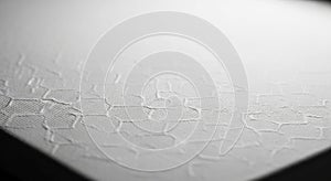 Close Up Macro Shot Of A Textured White Surface With Hexagonal Pattern background