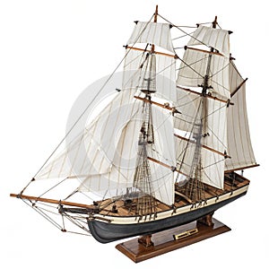 Detailed model sailboat with intricate rigging isolated photo