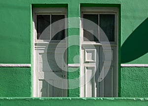 Detailed photo of house in the Malay Quarter, Bo-Kaap, Cape Town, South Africa. Historical area of brightly painted houses