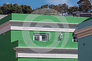 Detailed photo of houses in the Malay Quarter, Bo-Kaap, Cape Town, South Africa. Historical area of brightly painted houses