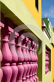 Detailed photo of houses in the Malay Quarter, Bo-Kaap, Cape Town, South Africa. Historical area of brightly painted houses