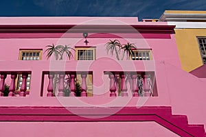 Detailed photo of houses in the Malay Quarter, Bo-Kaap, Cape Town, South Africa. Historical area of brightly painted houses