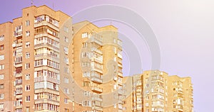 Detailed photo of multi-storey residential building with lots of balconies and windows. Hostels for poor people in Russia and Ukr