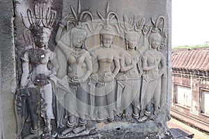 Detailed picture of four well preserved shiva, hindu, religon murals, bas relief and one damaged, angkor wat