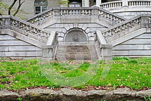 A Detailed Set of Stone Steps Leading Up to a Mansion