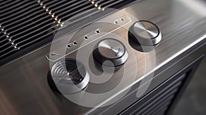 A detailed shot of the fans sleek silver control panel with buttons for rotation and light