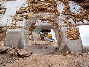 Detailed steel teeth of excavator bucket. Scarry  bucket teeth photo