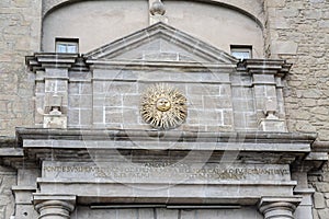 Detailed sun symbol of the city in the archway to Solsona, Spain photo