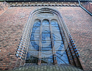 Detailed view on an aged and weathered medieval church building