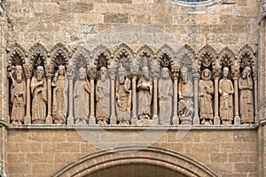 Detailed view of a amazing Romanesque sculpture on the Chain Gate, Cuidad Rodrigo Cathedral facade, with Old Testament photo