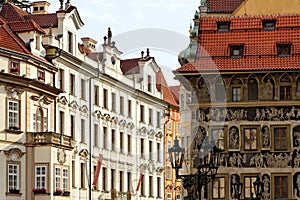 A detailed view of the beautiful House at the Minute on the right, located near the Old Town Square in Prague