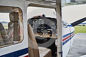 Detailed view of Cessna 172 Skyhawk 2 airplane interior standing on a runway.