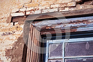 Detailed view derelict building window frame wall