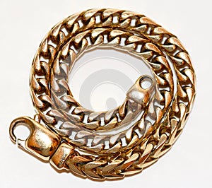 Detailed view of 18 karat gold bracelet. photo