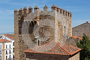 Detailed view at the medieval tower Bujaco, iconic Torre Bujaco, a heritage building on Plaza Mayor in CÃ¡ceres city downtown,