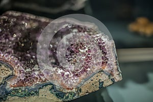 Detailed view of a mineral stone on blurred background