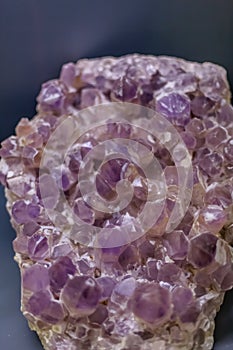 Detailed view of a mineral stone on blurred background