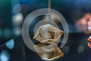 Detailed view of a mineral stone on blurred background photo