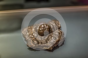 Detailed view of a mineral stone on blurred background photo