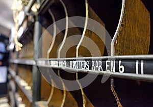 Detailed view o a mobile letter sorting office seen within a railway car.