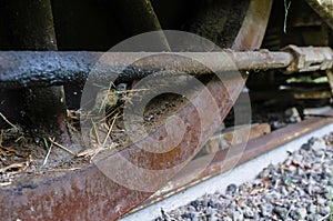 Detailed view of an old, dirty railway wheel