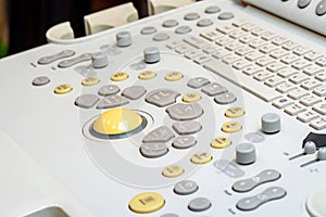 A detailed view of a professional modern ultrasound machines control panel, detail closeup shot, no people. Ultrasound clinic