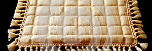 Detailed view of a rug with tassels close-up