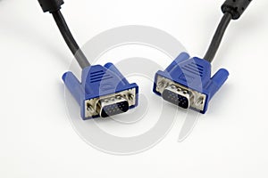 Detailed view of two VGA video connectors with black cables